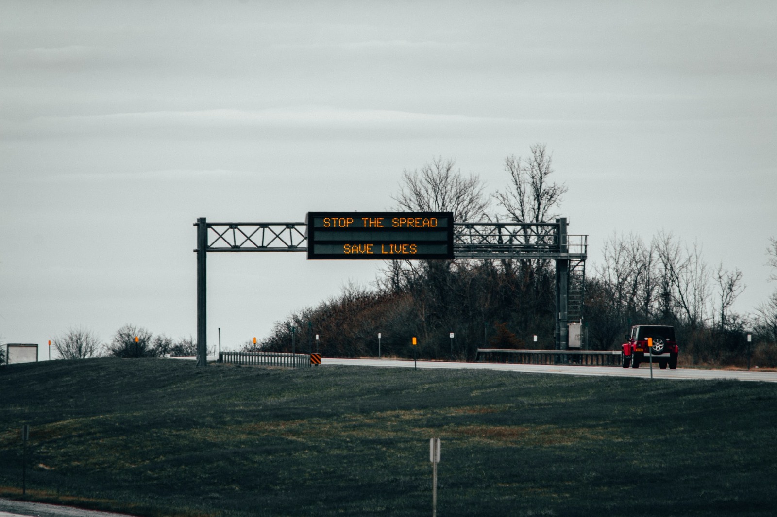 Sign reading stay home save lives