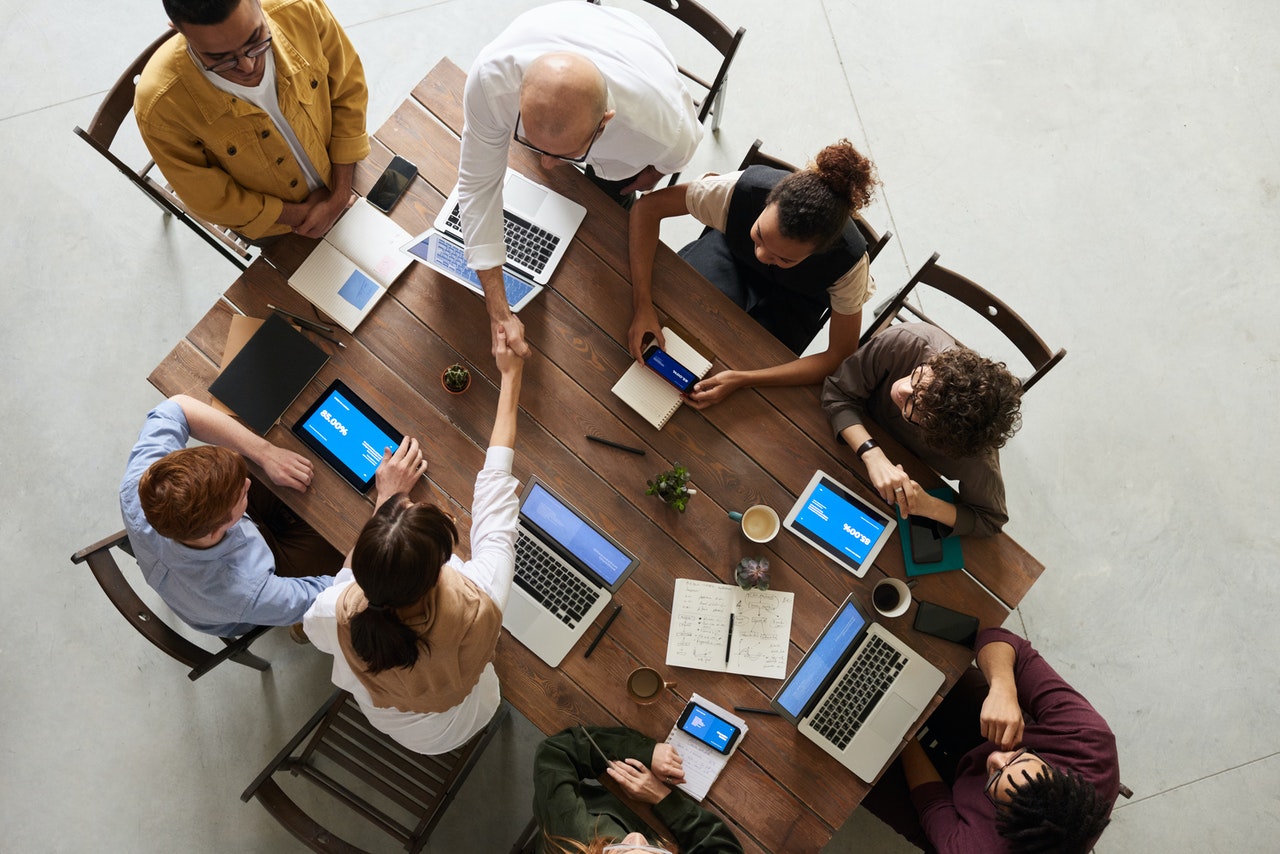 laptop desk people tech pexels