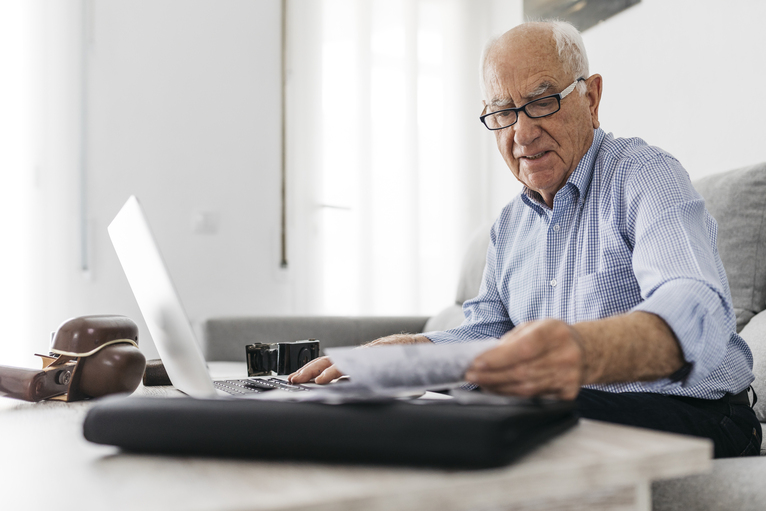 Senior man working from home