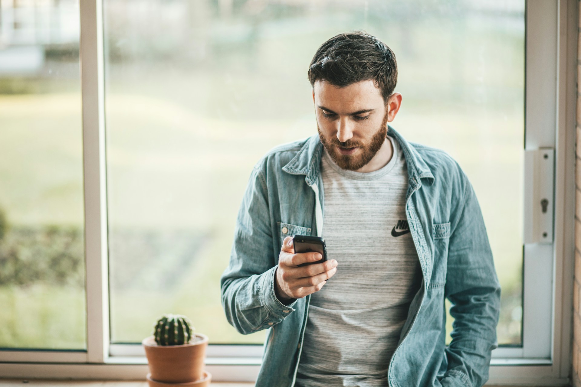 Man using phone / Unsplash